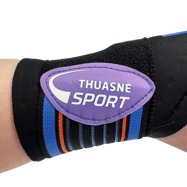 Бандаж на променезап'ястковий суглоб з фіксацією великого пальця THUASNE Спорт 0332, Франція (чорний) обрати на сайті Orto-med.com.ua