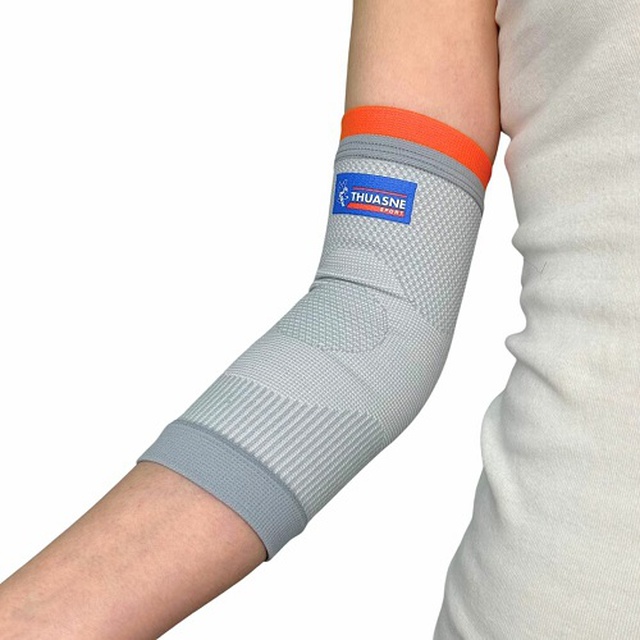 Ортез эластичный для локтевого сустава Thuasne 0338, светло-серого цвета выбрать на сайте Orto-med.com.ua