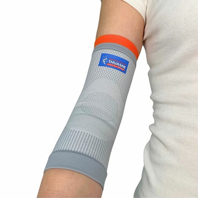Ортез еластичний для ліктьового суглоба Thuasne 0338, світло-сірого кольору обрати на сайті Orto-med.com.ua