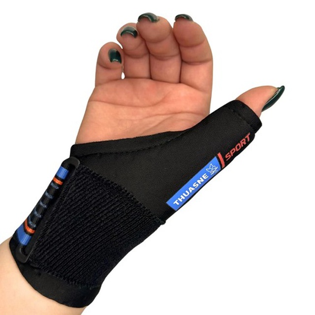 Замовити бандаж на променезап'ястковий суглоб з фіксацією великого пальця THUASNE Спорт 0332, Франція (чорний) на сайті Orto-med.com.ua